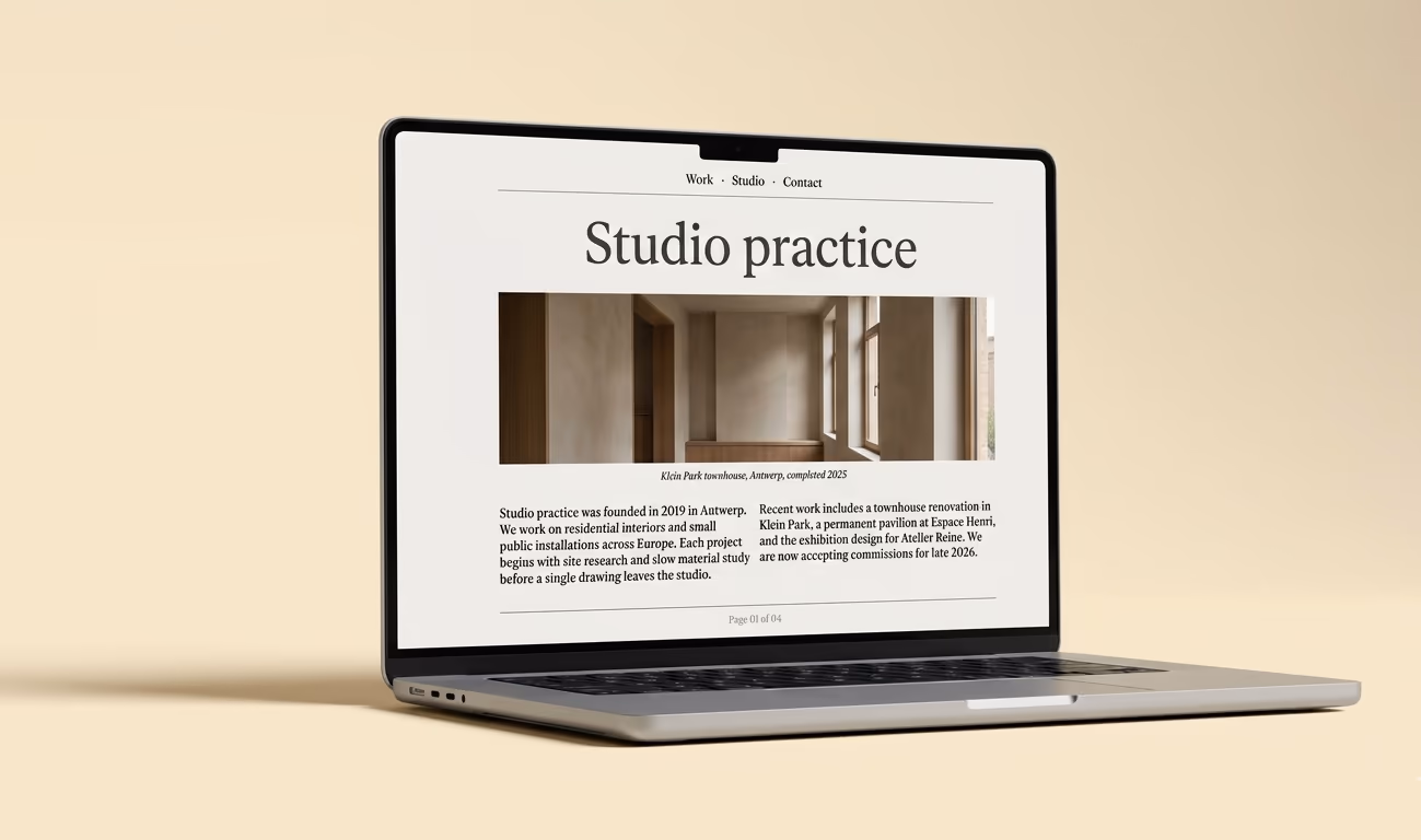 Editorial portfolio website on MacBook, cream studio scene